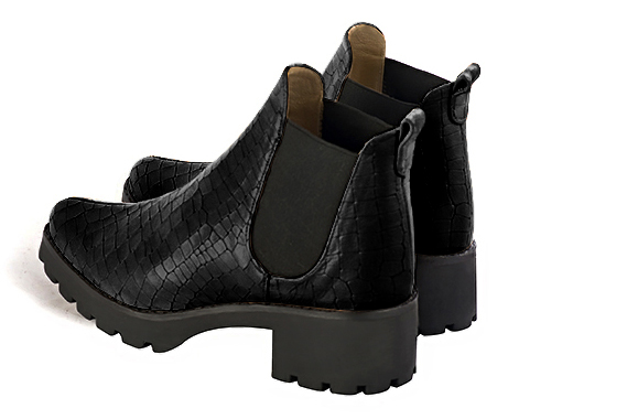 Satin black women's ankle boots, with elastics. Round toe. Low rubber soles. Rear view - Florence KOOIJMAN